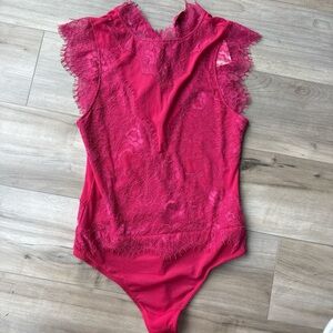 Free People open back lace bodysuit new with tags size medium